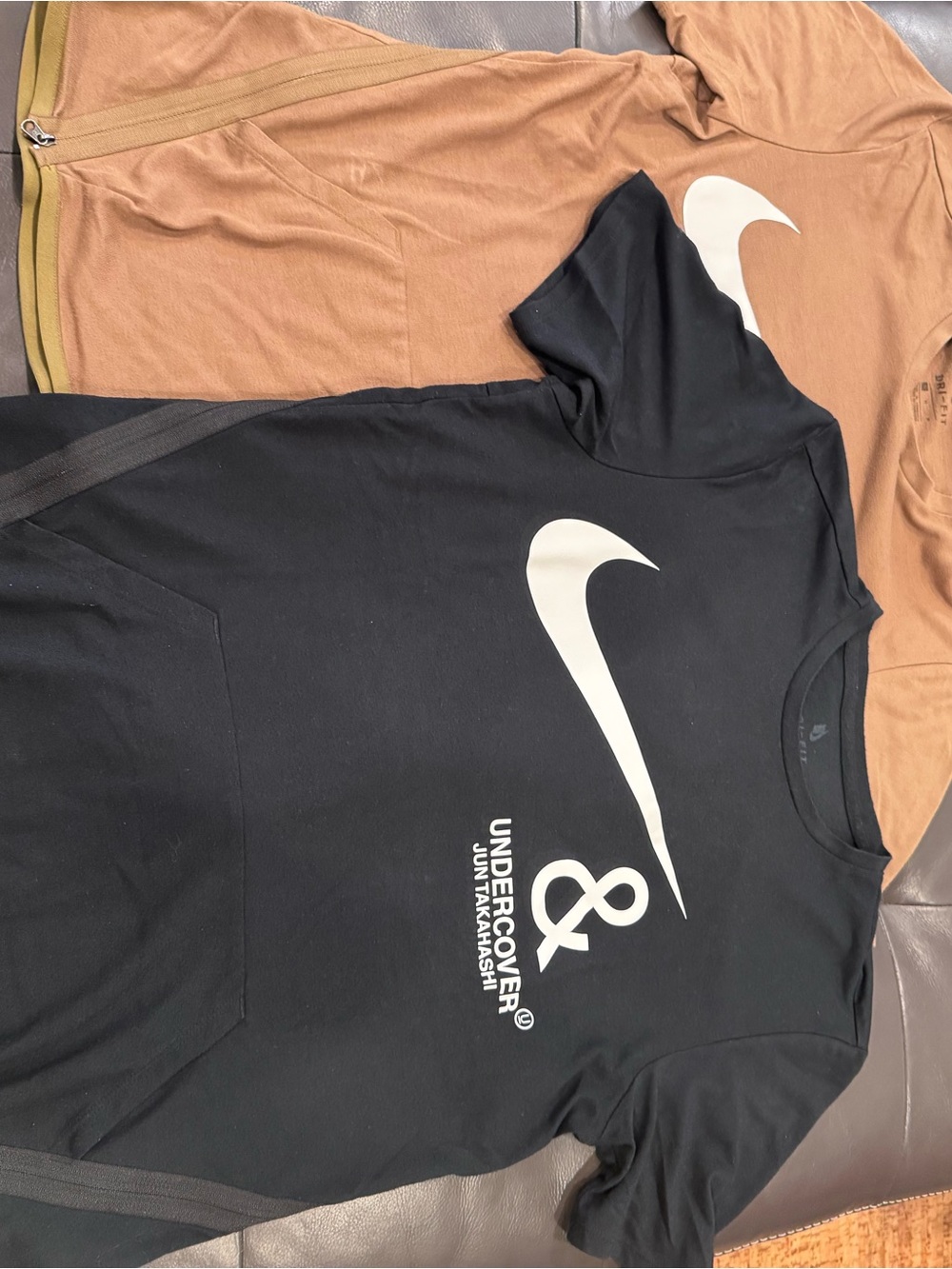 Undercover Black and Brown Tee with White Graphic Swoosh